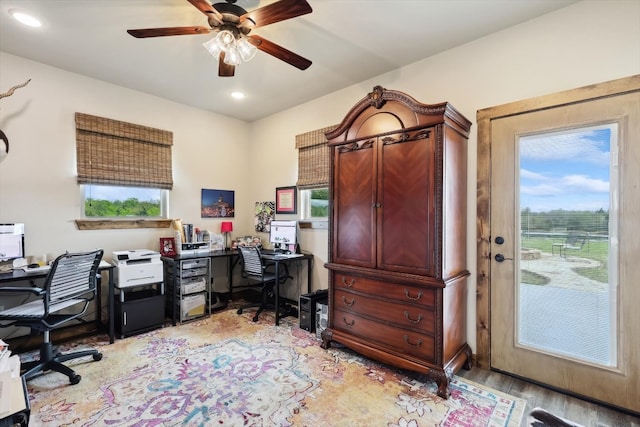 office area featuring ceiling fan and light hardwood / wood-style floors