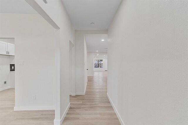 hall featuring light hardwood / wood-style flooring