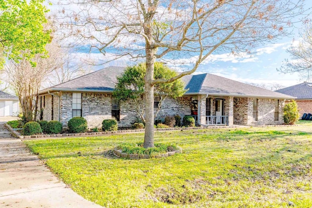 ranch-style house with a front lawn