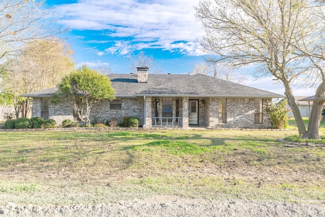 ranch-style home with a porch and a front lawn