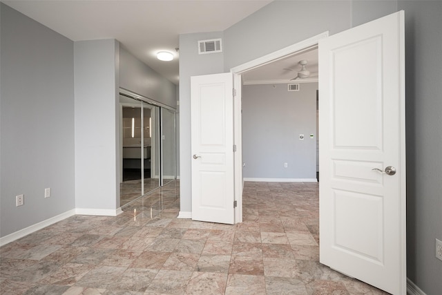 unfurnished bedroom with a closet