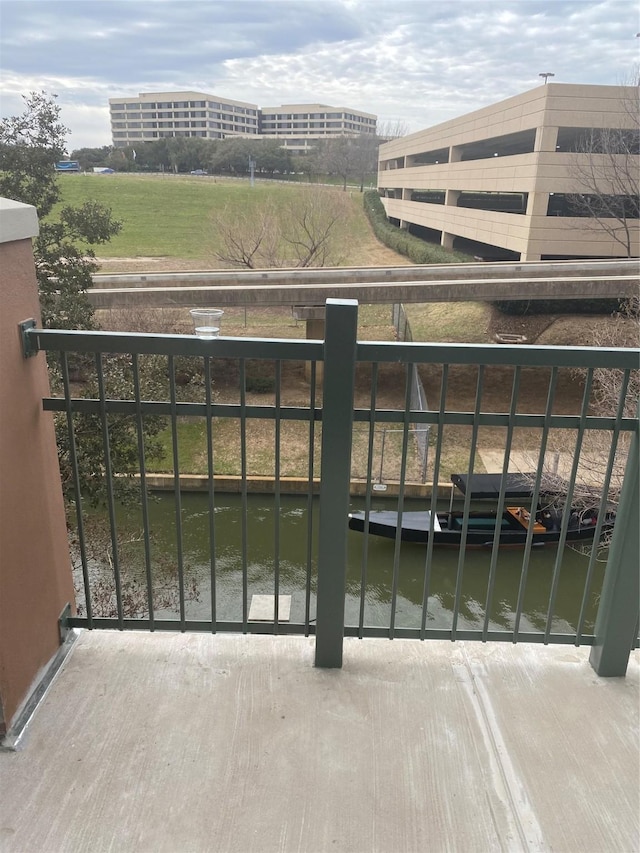 view of gate with a water view