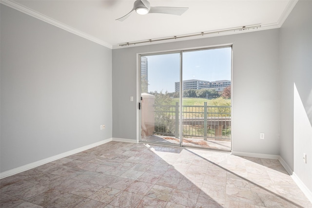 spare room featuring ceiling fan, plenty of natural light, and ornamental molding