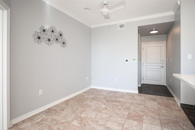 spare room featuring ceiling fan and crown molding