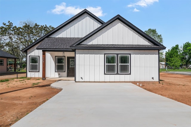 modern farmhouse style home with a patio