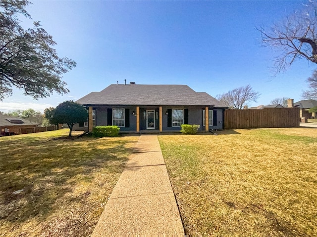 single story home with a front yard