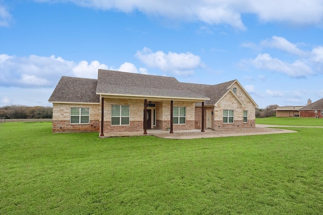 ranch-style house featuring a front yard