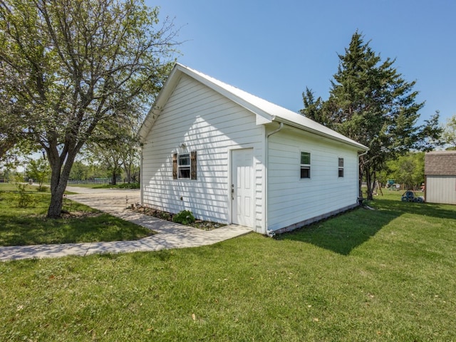 view of home's exterior featuring a lawn