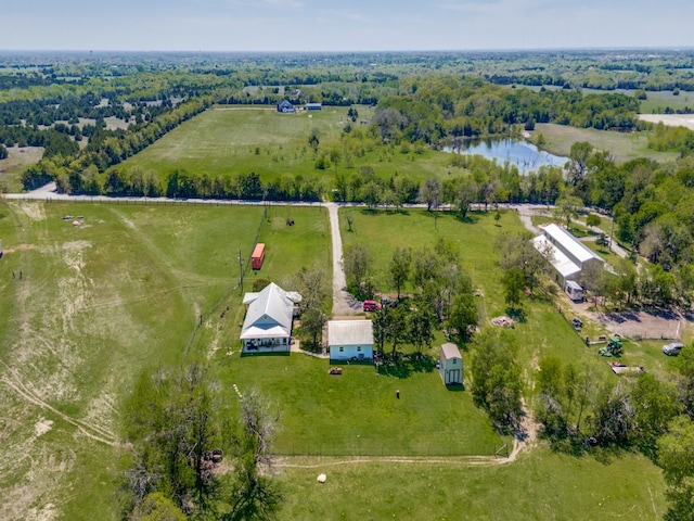 drone / aerial view featuring a rural view and a water view