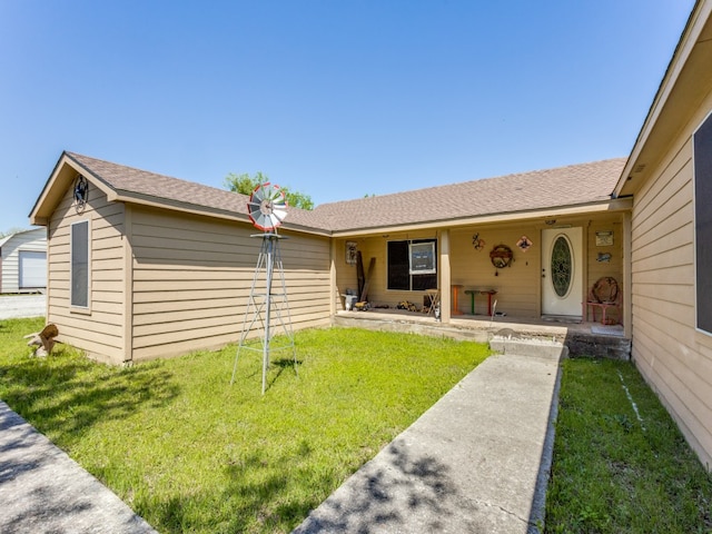 ranch-style house with a front yard