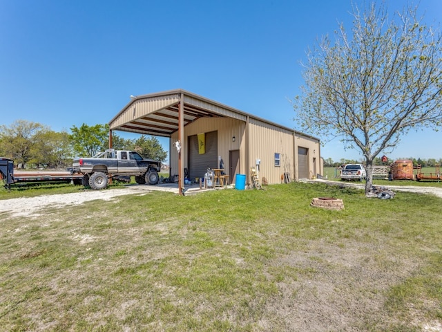 view of outdoor structure featuring a yard