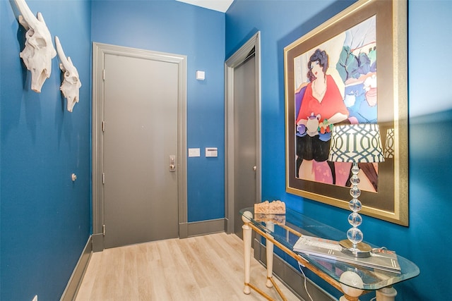 foyer entrance with wood finished floors