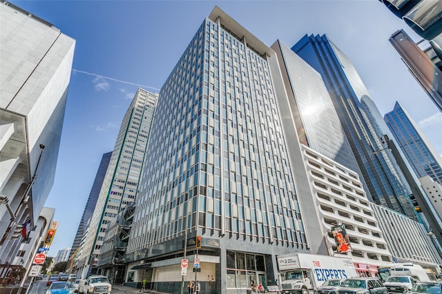 view of building exterior featuring a city view