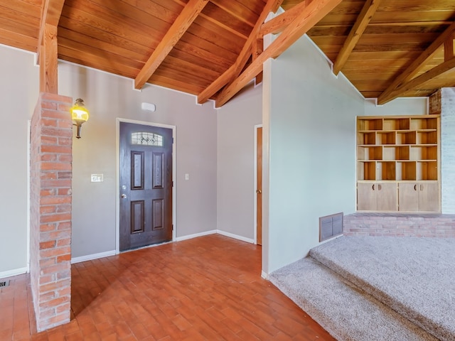 foyer featuring brick wall, wood ceiling, lofted ceiling with beams, and hardwood / wood-style flooring