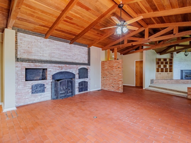 unfurnished living room with brick wall, a brick fireplace, ceiling fan, and wood ceiling