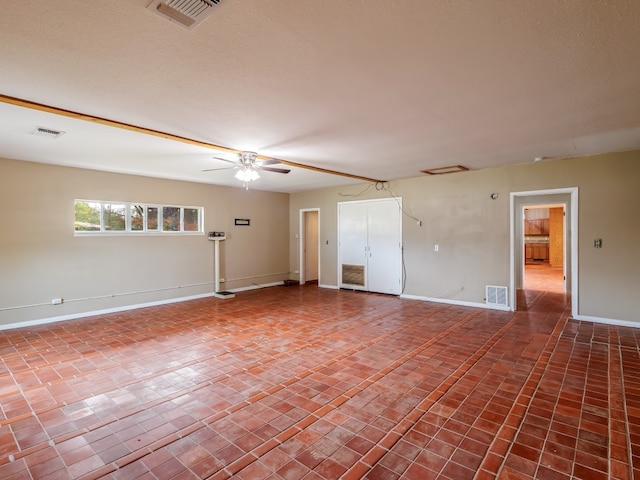 empty room with ceiling fan