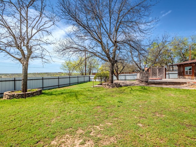 view of yard with a deck