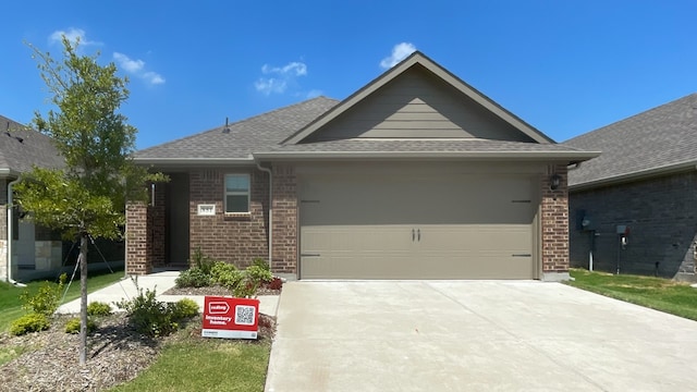 single story home featuring a garage