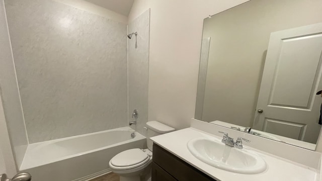 full bathroom featuring toilet, vanity, and tub / shower combination