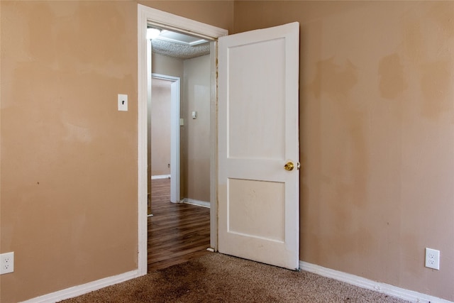 unfurnished room with hardwood / wood-style floors