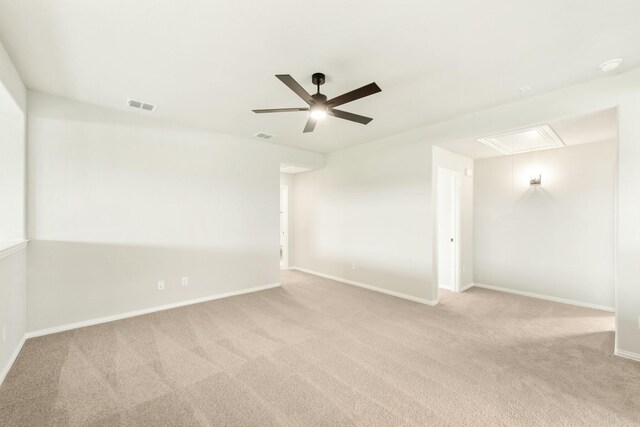 carpeted empty room with ceiling fan