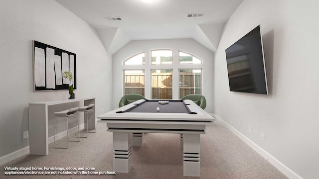 recreation room with light colored carpet, pool table, and vaulted ceiling