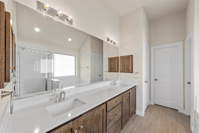 bathroom featuring dual vanity, tile patterned floors, and independent shower and bath