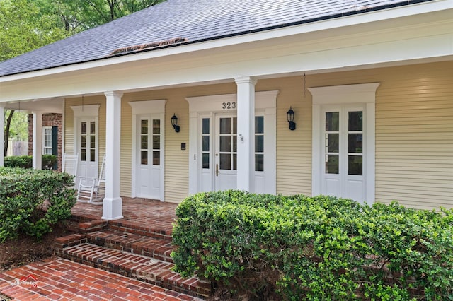 doorway to property featuring a porch