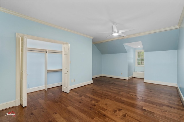 additional living space featuring dark hardwood / wood-style flooring, ceiling fan, and vaulted ceiling