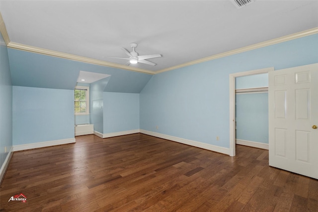 additional living space with ceiling fan, vaulted ceiling, and dark hardwood / wood-style floors