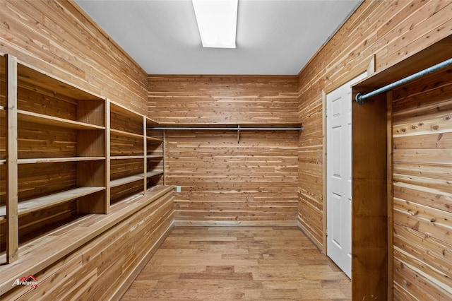 walk in closet featuring light wood-type flooring