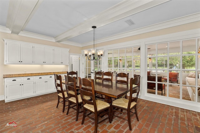 dining area featuring ornamental molding, a chandelier, and beamed ceiling