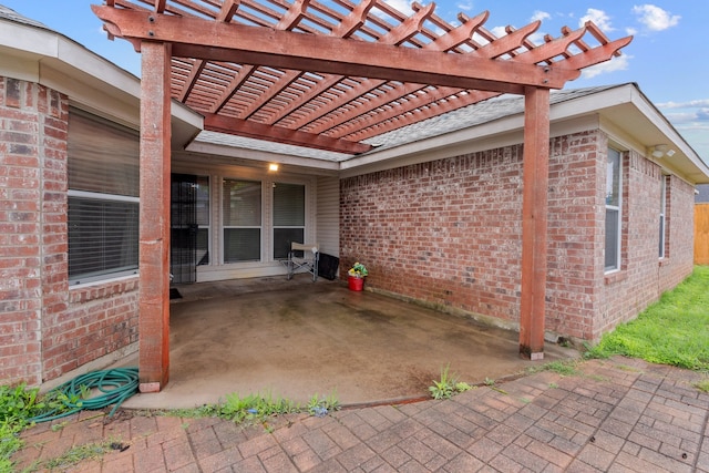 view of patio featuring a pergola