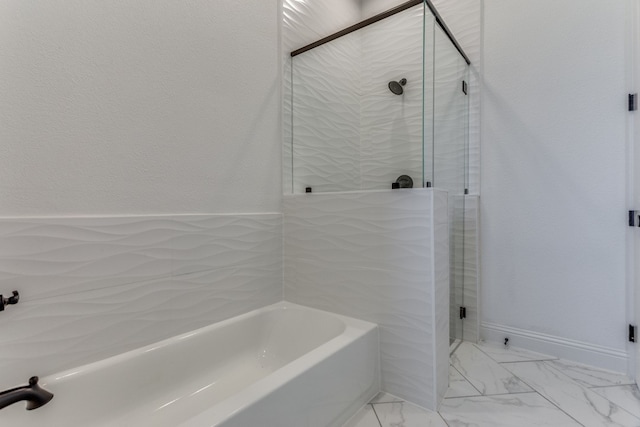 bathroom with shower with separate bathtub