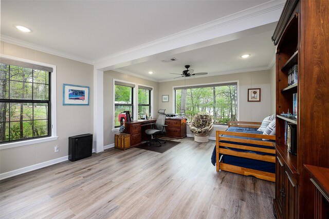 bathroom with wood-type flooring, a shower, vanity with extensive cabinet space, and double sink