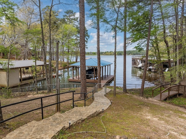 dock area featuring a water view