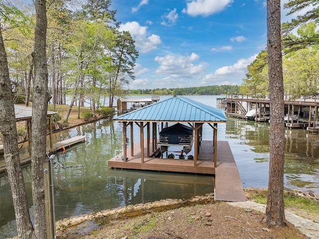 view of dock with a water view