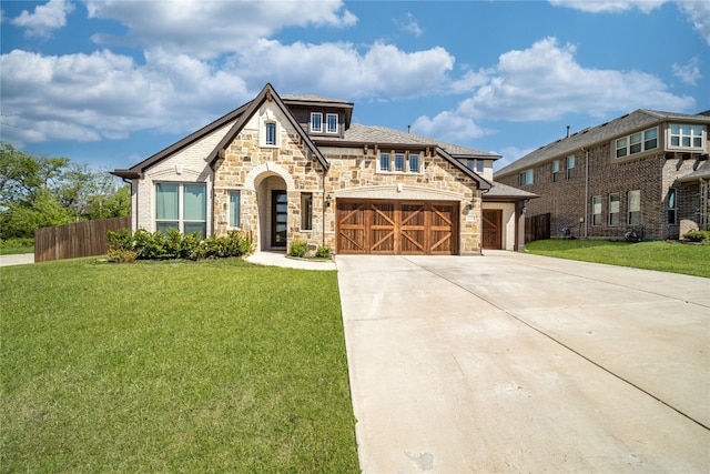 view of front facade with a front lawn and a garage