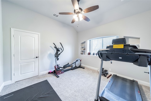 workout room featuring light carpet and ceiling fan