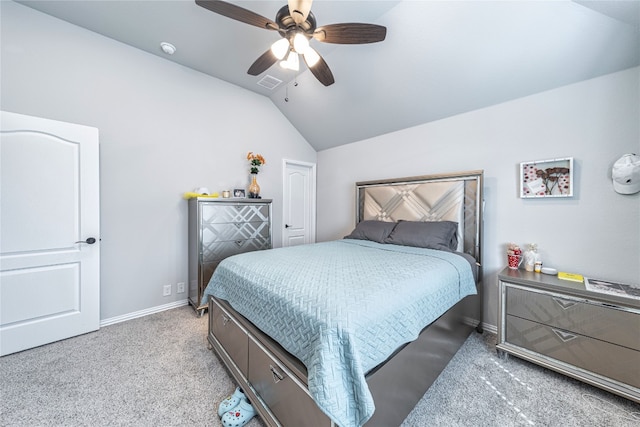 carpeted bedroom with ceiling fan and lofted ceiling