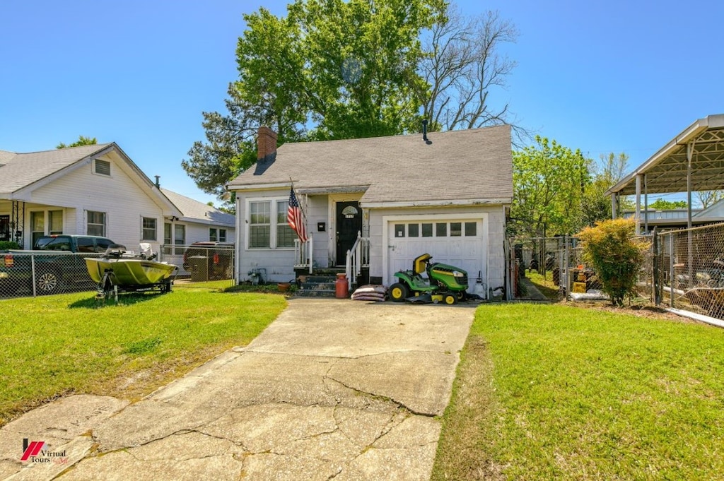 view of front facade featuring a front lawn and a garage