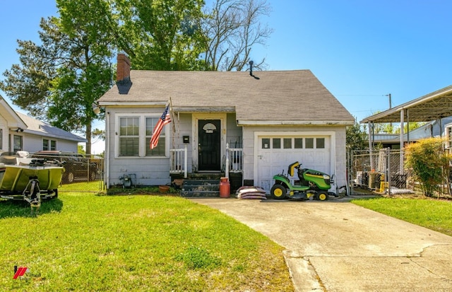 view of front of house with a front yard and a garage