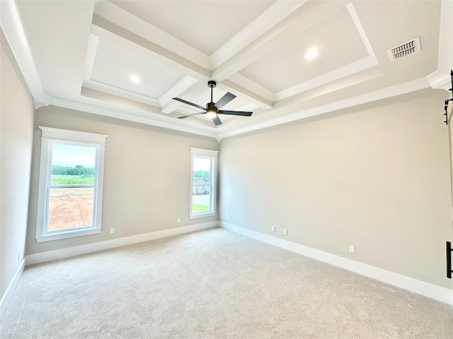 carpeted empty room with ceiling fan, ornamental molding, coffered ceiling, and beam ceiling