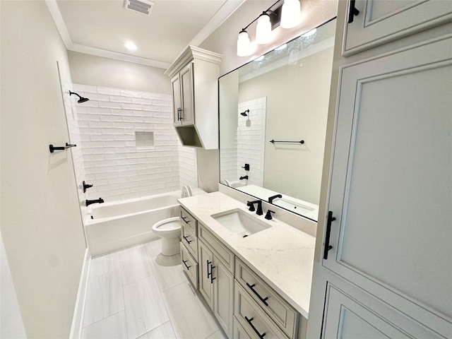 full bathroom with vanity, crown molding, toilet, and tiled shower / bath