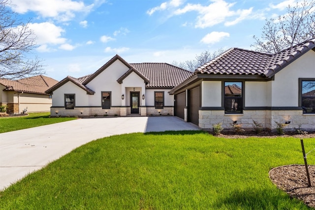 mediterranean / spanish house with a front lawn