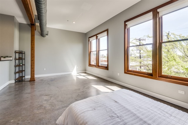 bedroom featuring multiple windows