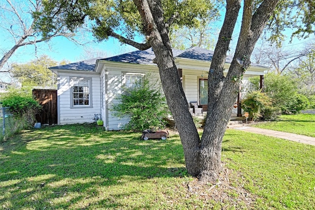 exterior space featuring a front lawn