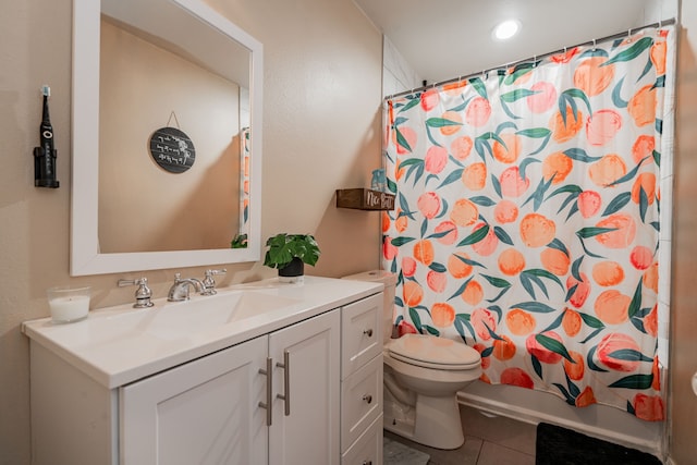 full bathroom with vanity, shower / bath combo with shower curtain, toilet, and tile patterned flooring