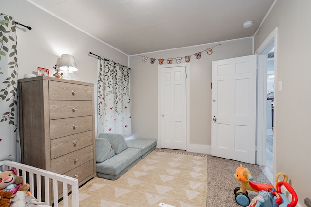 bedroom with a nursery area