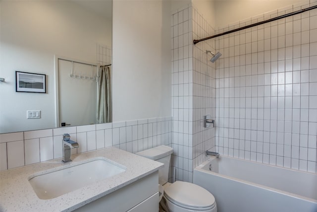 bathroom featuring shower / tub combo with curtain, tile walls, toilet, and vanity